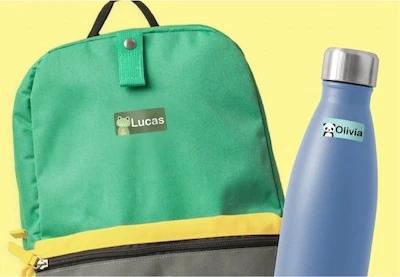 Green backpack and blue waterbottle with name labels
