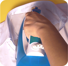 Ironing the label onto the garment
